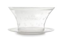 An Orrefors Bowl and Saucer Height of bowl 6 3/4 inches. — DESIGNED BY EDWARD HALD, 1926