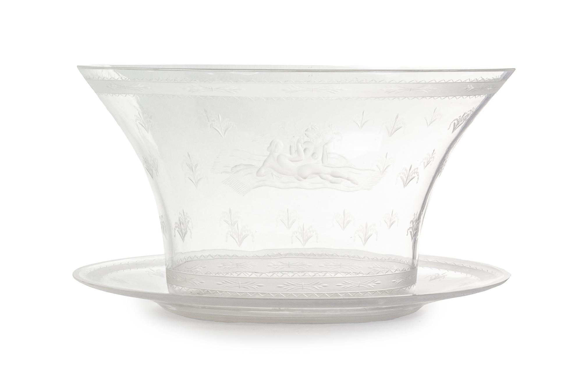 An Orrefors Bowl and Saucer Height of bowl 6 3/4 inches. — DESIGNED BY EDWARD HALD, 1926
