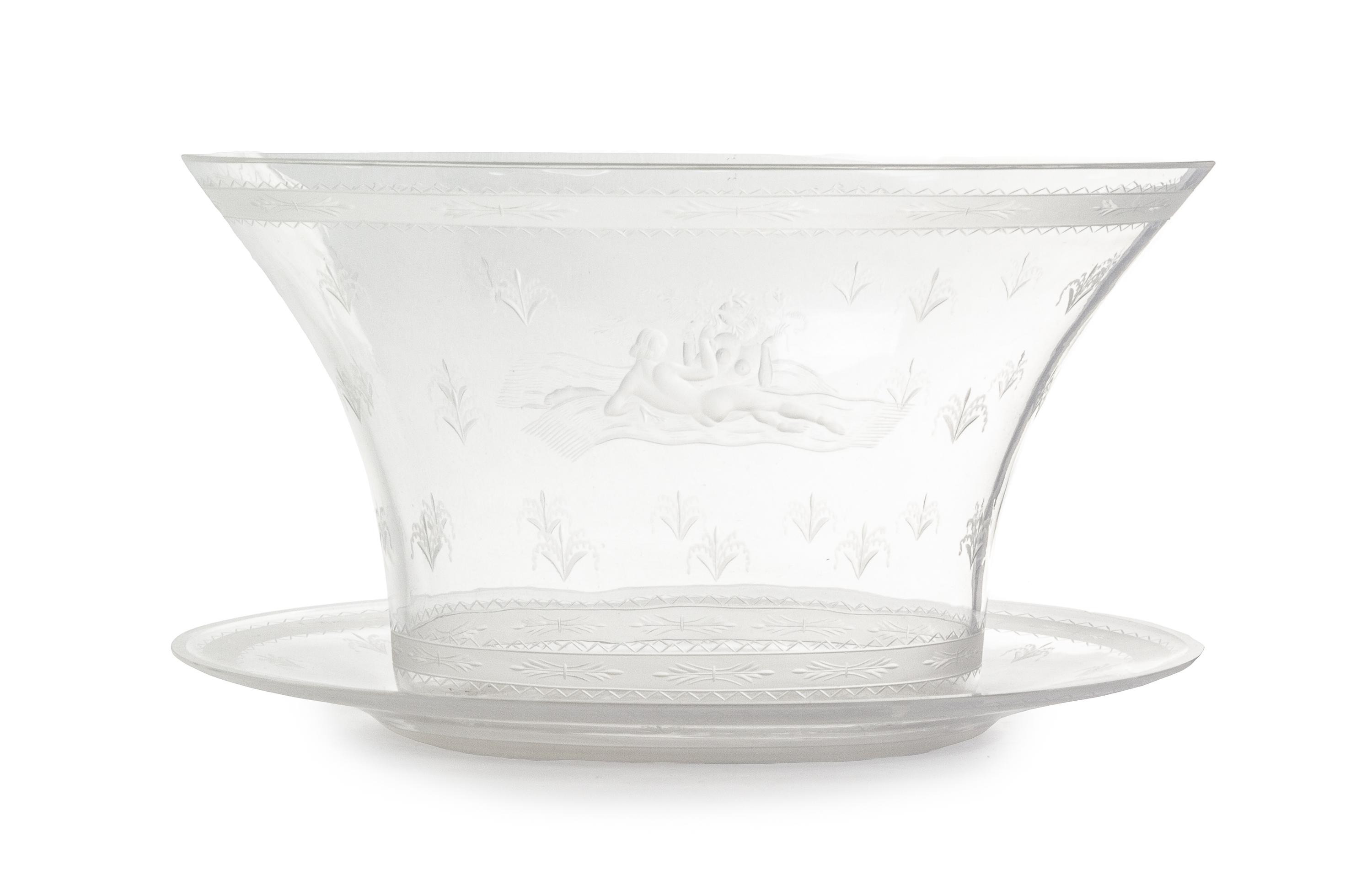 An Orrefors Bowl and Saucer Height of bowl 6 3/4 inches. — DESIGNED BY EDWARD HALD, 1926