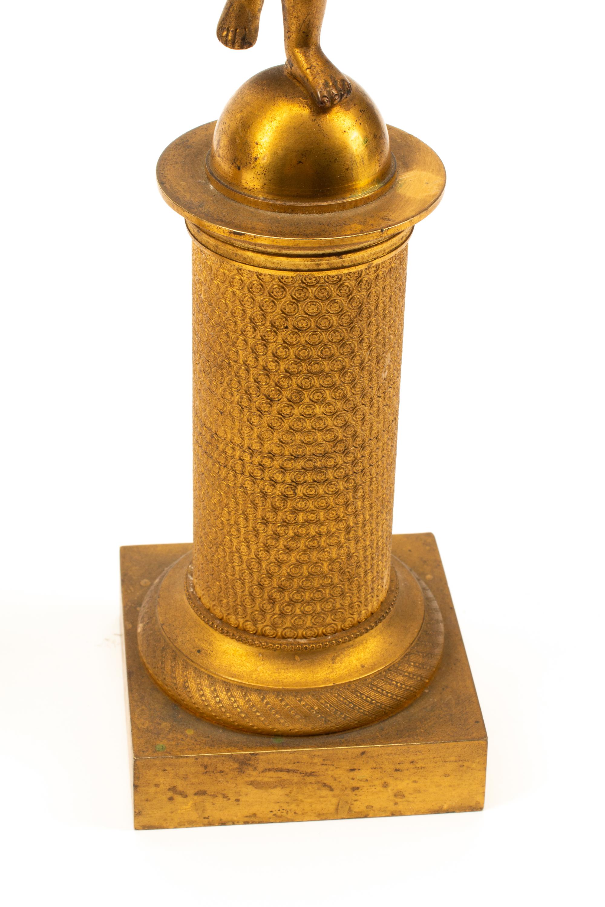 A Pair of Charles X Gilt Bronze Three-Light Candelabra