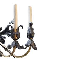 A Brass and Iron Seven Arm Wall Sconce, United States, Circa 1930,