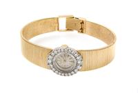 A 14 Karat Yellow Gold and Diamond Wristwatch, Concord, 29.20 dwts.
