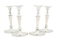 Four English Silver Weighted Candlesticks