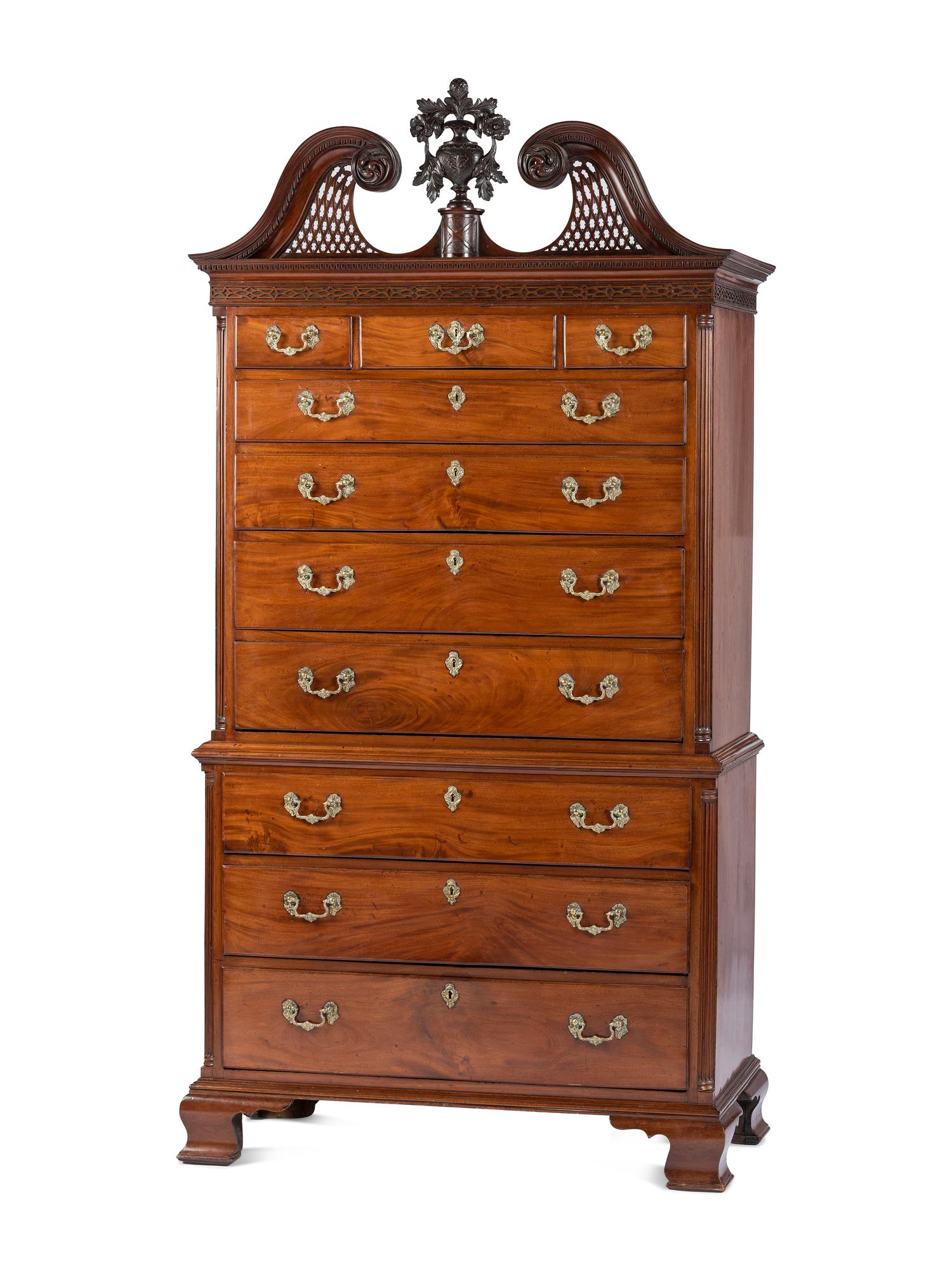 The Holcum Family Chippendale Pierce-Carved and Figured Mahogany Bonnet Top Chest-on-Chest