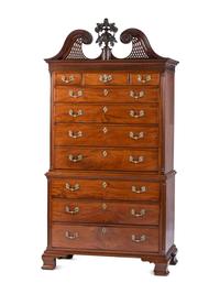 The Holcum Family Chippendale Pierce-Carved and Figured Mahogany Bonnet Top Chest-on-Chest