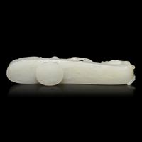 Two Chinese Jade and Jadeite Archer's Rings and a Jade 'Dragon' Belt Hook, Qing Dynasty 清 白玉、翡翠扳指及龍鈎一組三件