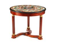 An Empire Style Gilt Bronze Mounted Mahogany Guéridon with a Specimen Marble Top