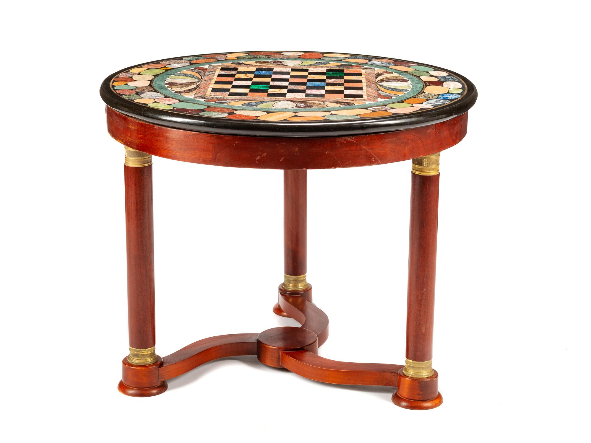 An Empire Style Gilt Bronze Mounted Mahogany Guéridon with a Specimen Marble Top