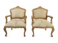 A Pair of French Provincial Fauteuils with Hide Upholstery — 20TH CENTURY