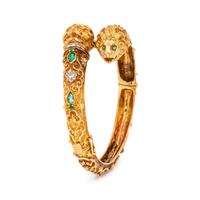 YELLOW GOLD, EMERALD AND DIAMOND LION BANGLE BRACELET