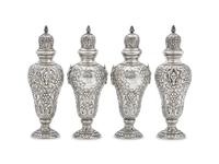 A Set of Four George V Silver Repoussé Casters