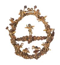 A Florentine Carved Giltwood and Silvered Wood Altarpiece with Musical Putti