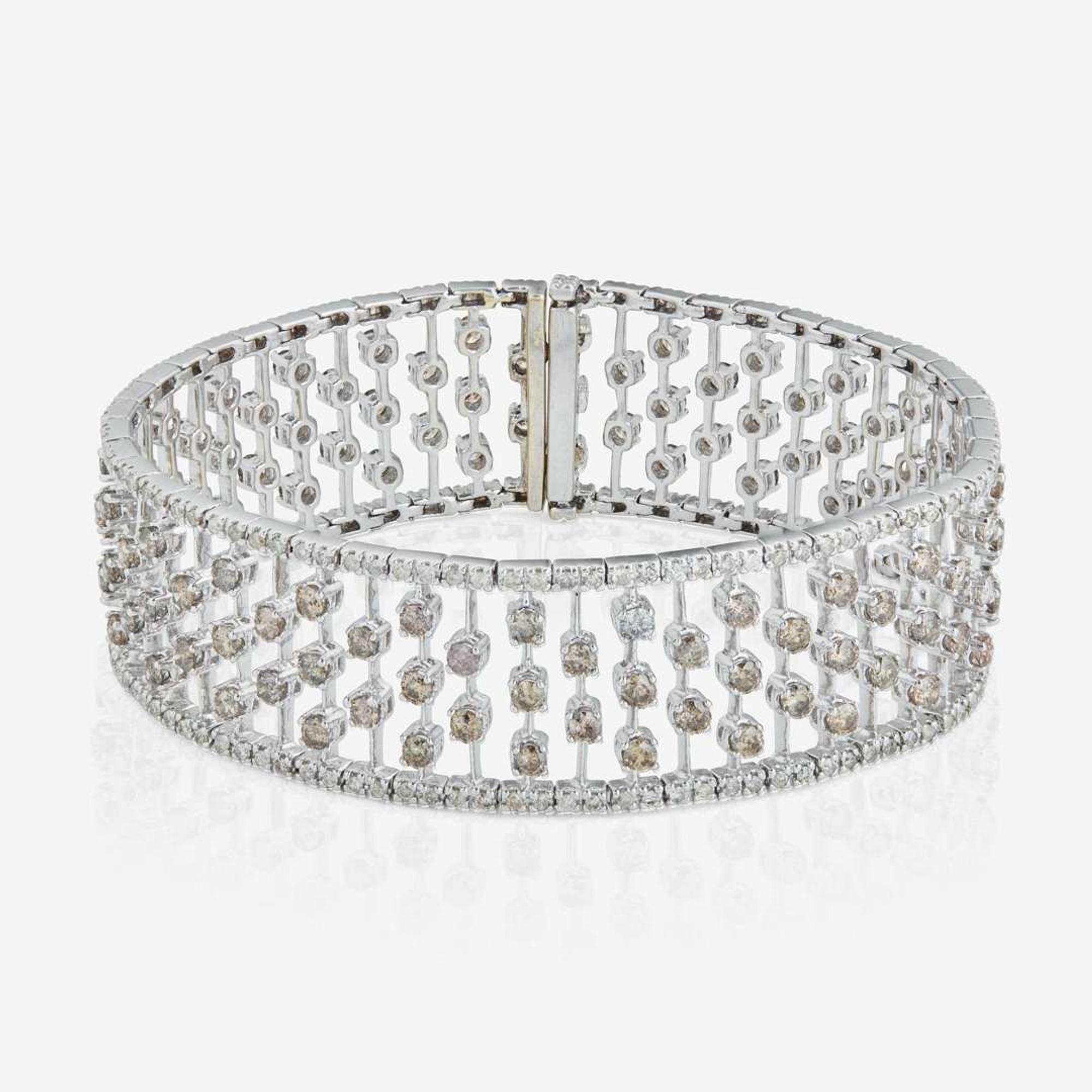 An 18K White Gold, Diamond, and Colored Diamond Bracelet