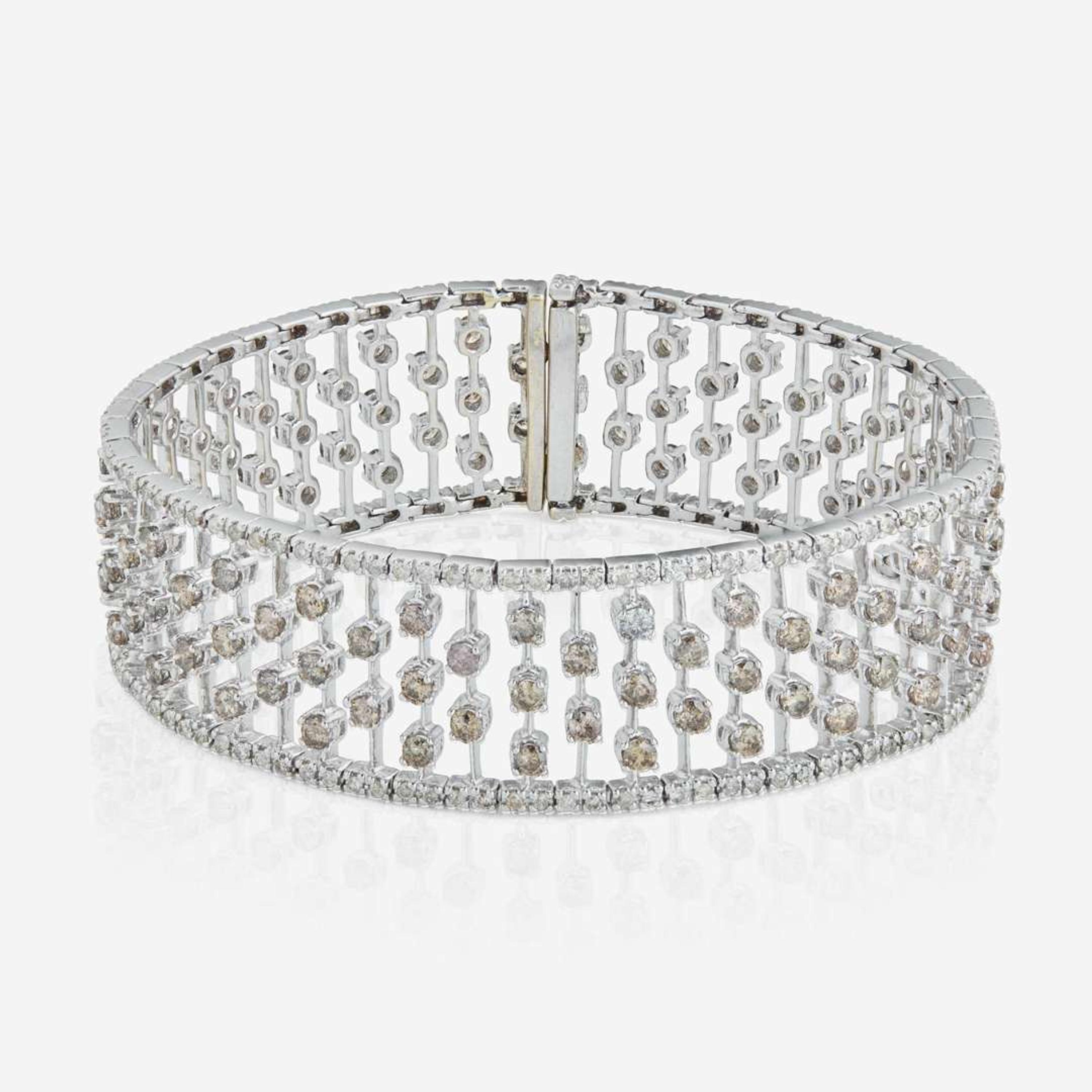 An 18K White Gold, Diamond, and Colored Diamond Bracelet
