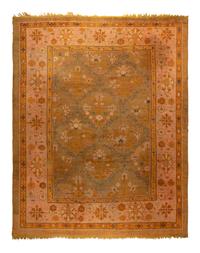 An Oushak Wool Rug
