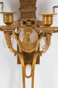 A Pair of Neoclassical Style Gilt-Bronze and Glass Four-Light Sconces