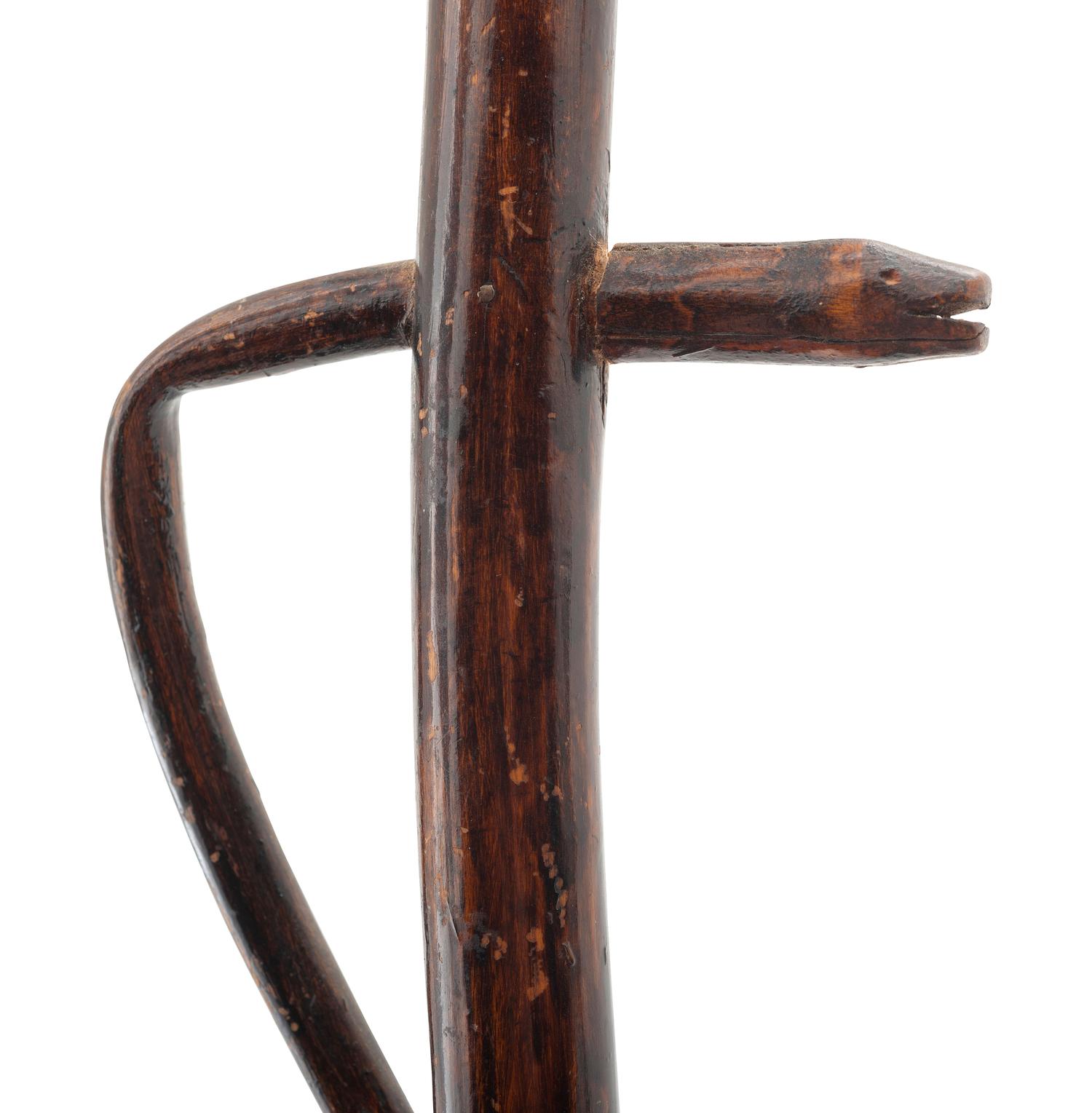 A Folk Art Carved Wood Bird and Serpent Cane