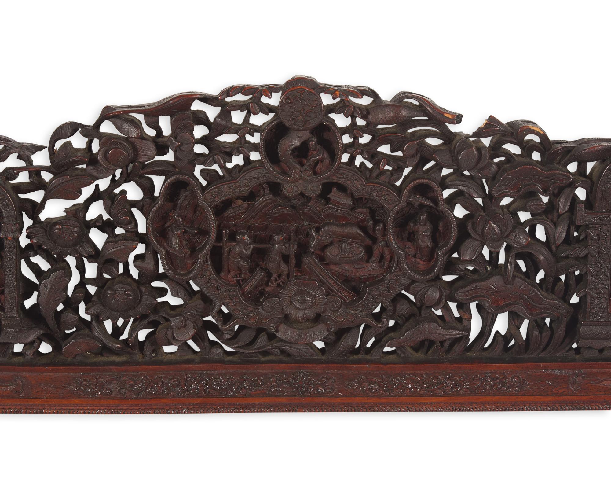 A large and impressive Chinese export carved and pierced stained wood frame, 19th century