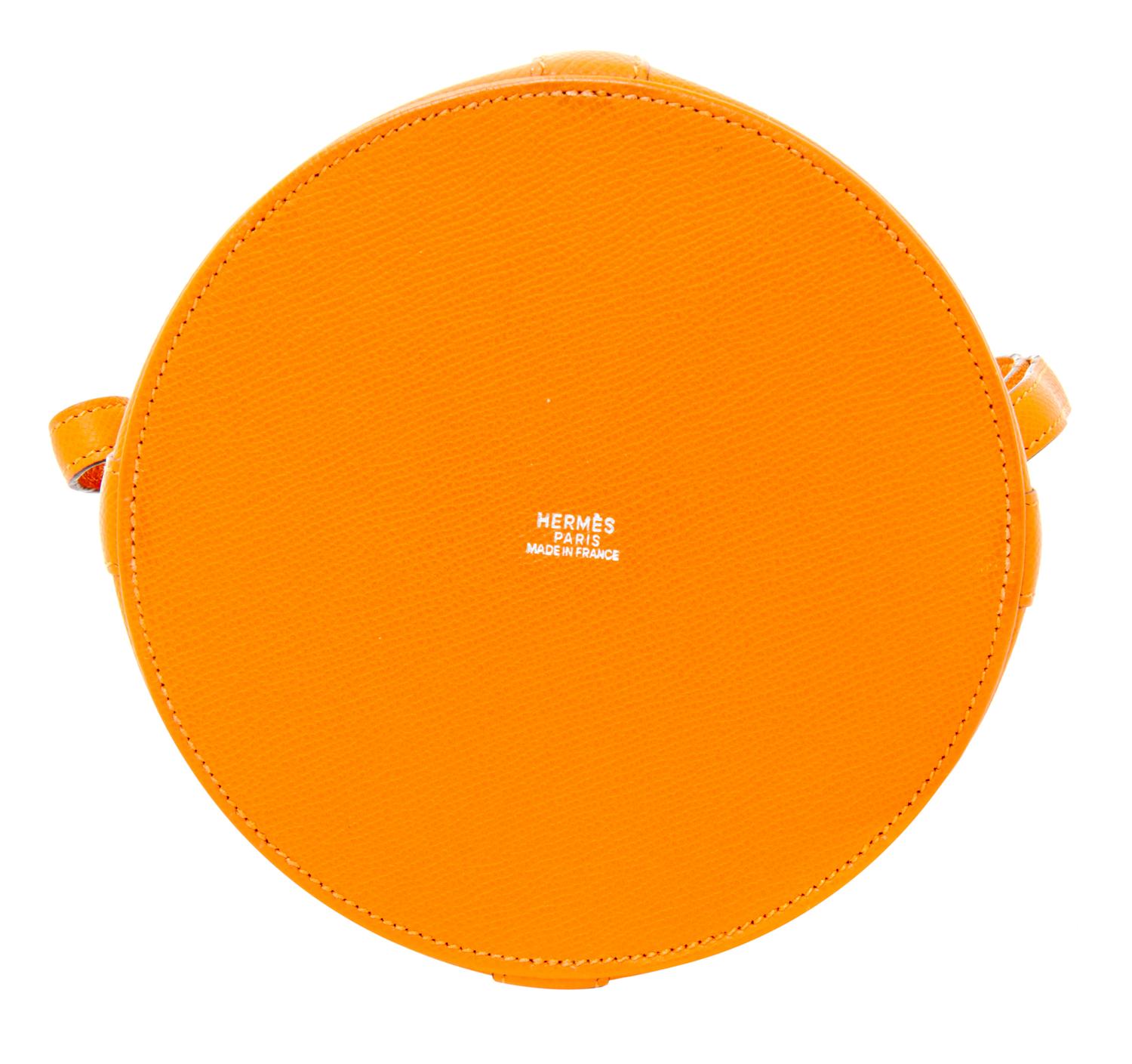An Hermes Orange Clemence Feed Handbag, 6.75" x 7.25" x 5".