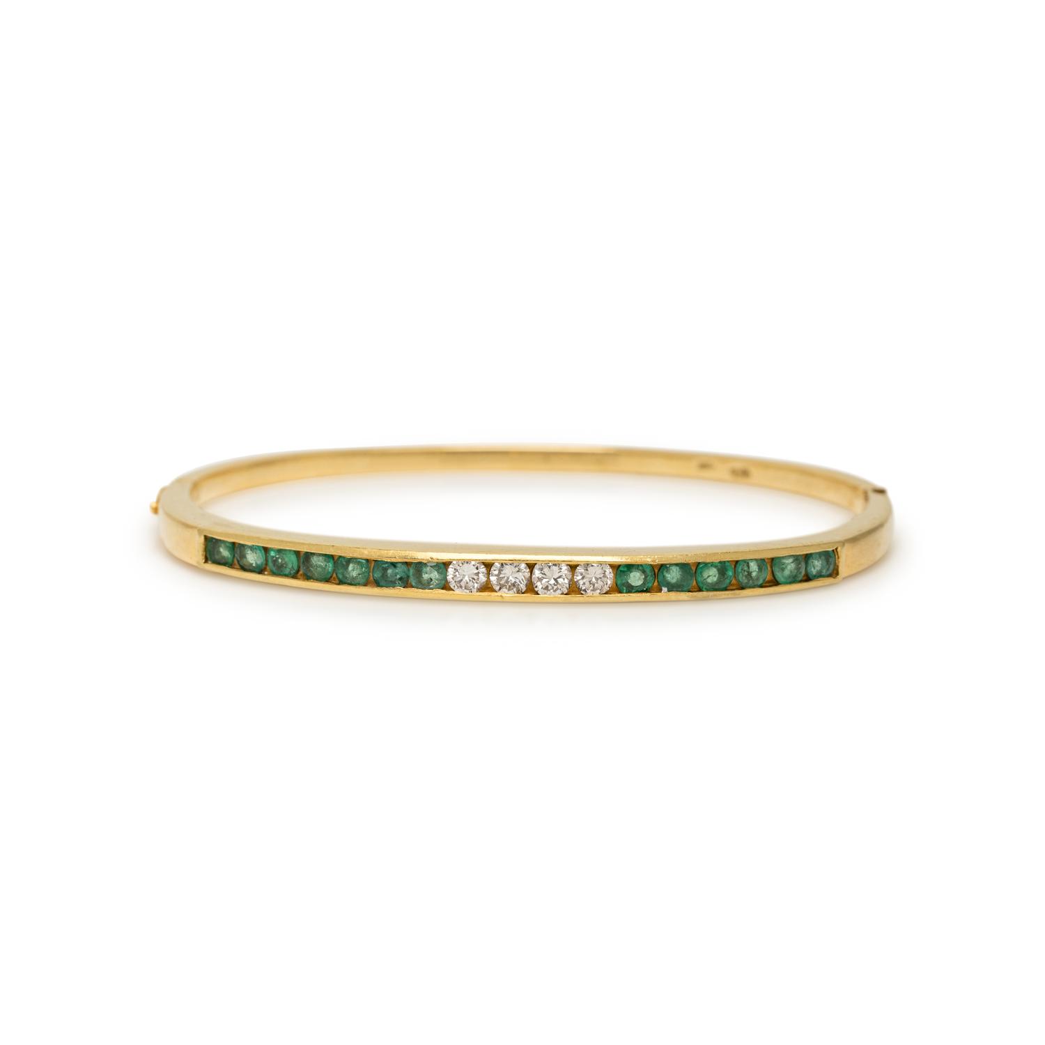 YELLOW GOLD, DIAMOND, AND EMERALD BANGLE BRACELET