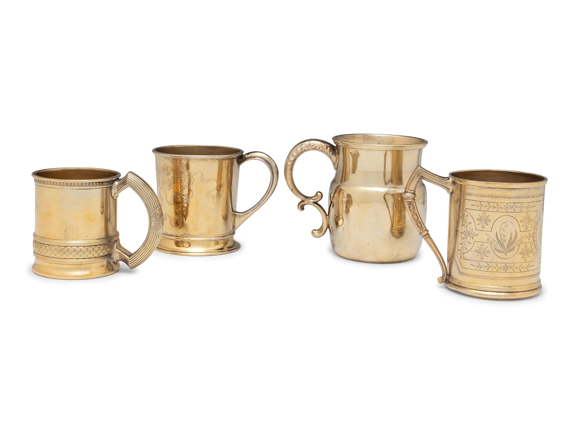 Four American Silver-Gilt Mugs