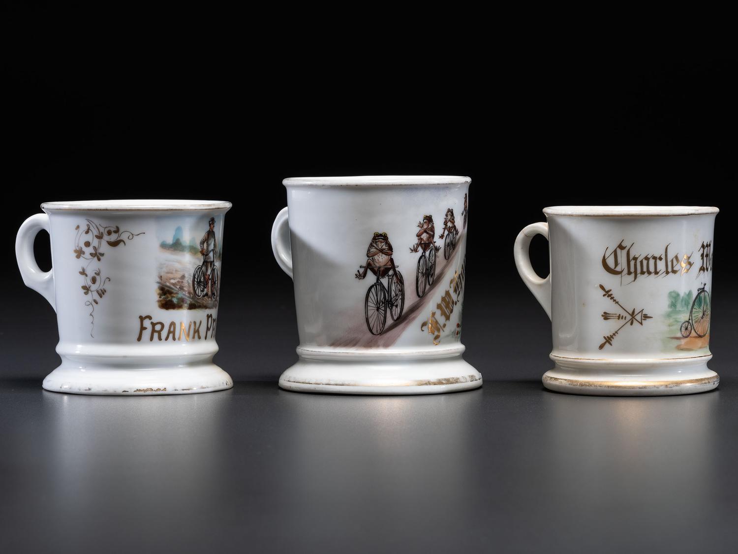 Three Cyclist's Porcelain Shaving Mugs