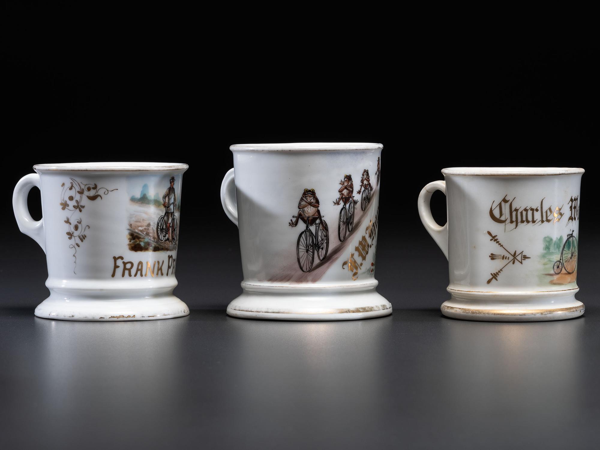 Three Cyclist's Porcelain Shaving Mugs