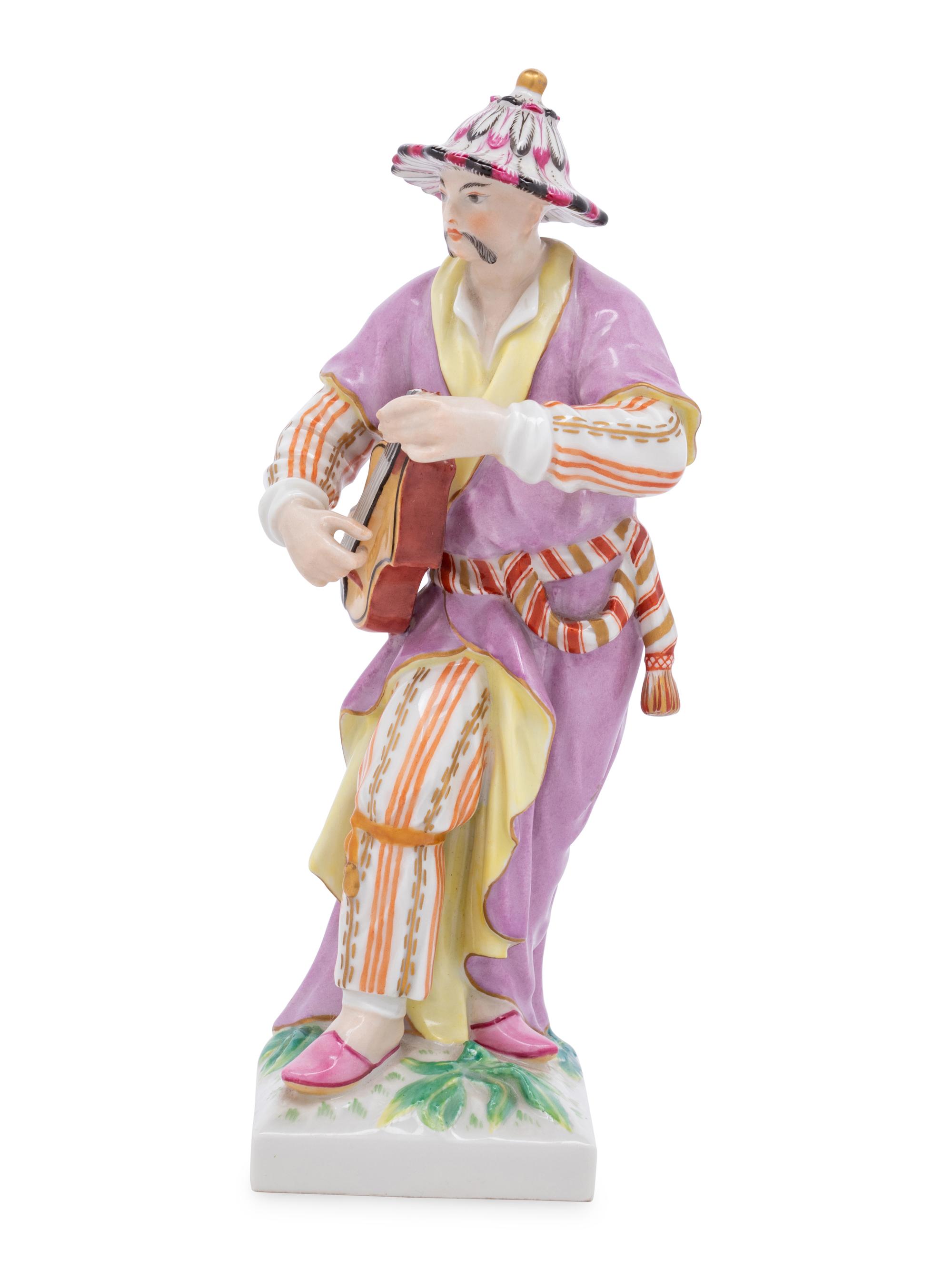 A Berlin (K.P.M.) Porcelain Figure of a Chinese Musician
