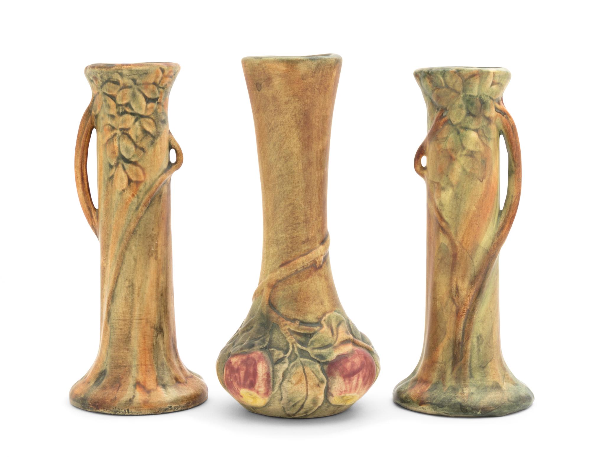 Three Weller Pottery Vases Height of first 8 1/2 inches, pair 8 1/4 inches.