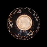 A Chinese Jizhou 'Papercut' Teabowl, Possibly Southern Song Dynasty 或為南宋 吉州窯貼花盞