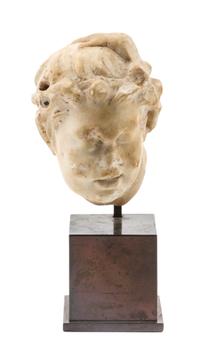 A Roman Marble Head of a Young Satyr Height 5 x width 4 x depth 4 1/8 inches. — ANTONINE DYNASTY, SECOND CENTURY A.D.