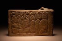 A Maya Limestone Panel with Glyphs