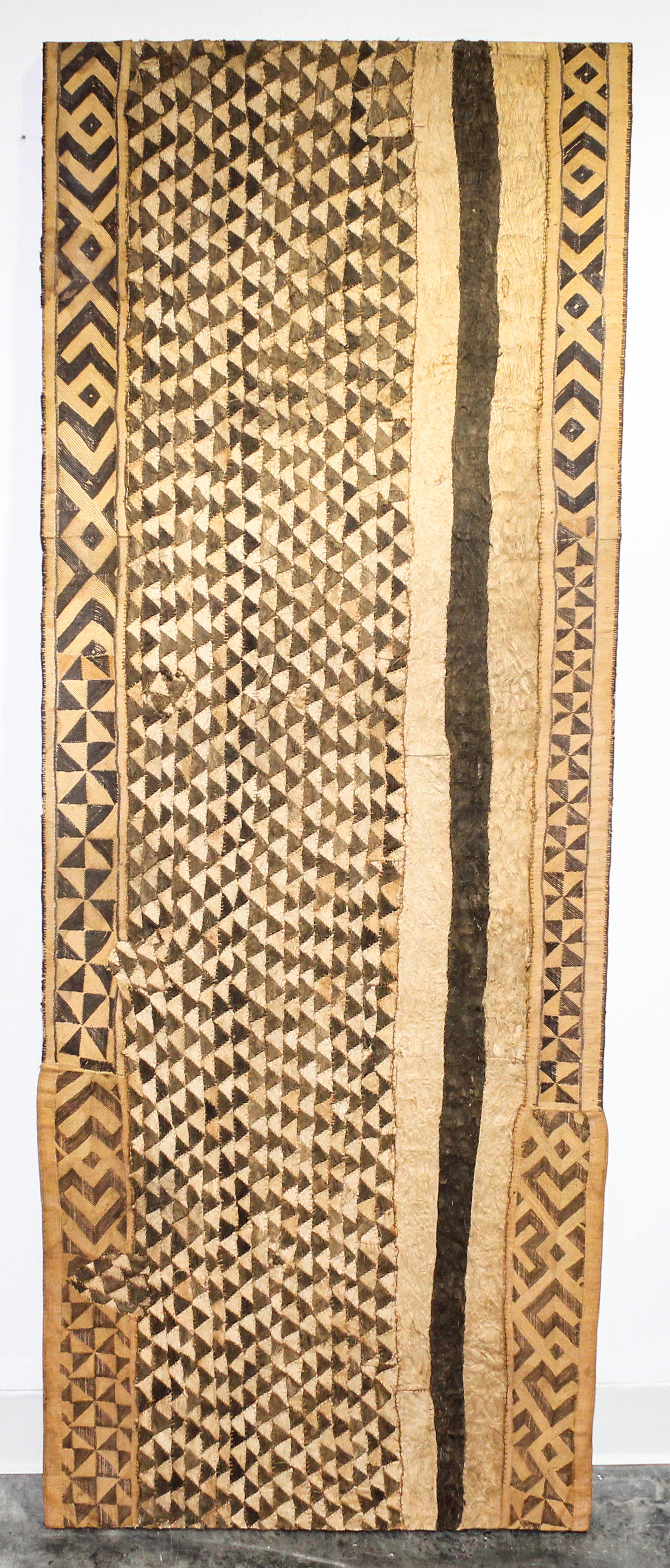 A Kuba Cloth Length 64 x width 24 inches.