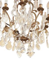 A French Gilt Bronze and Cut Glass Nine-Light Chandelier