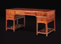 A huanghuali and mixed hardwoods double-pedestal desk 黃花梨及硬木桌一件