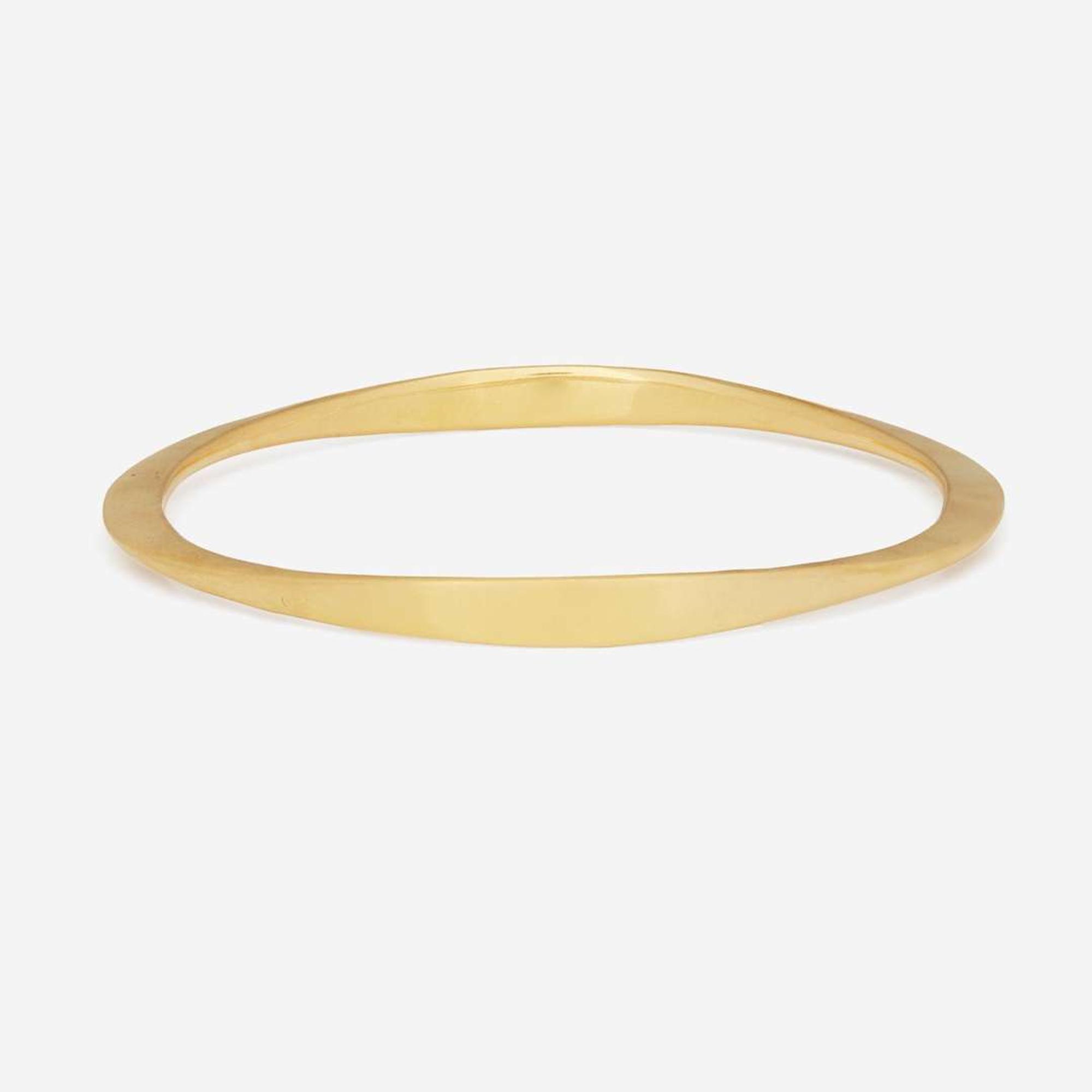 An 18K Yellow Gold Bangle Bracelet