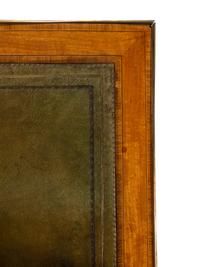 An English Gilt Bronze Mounted Satinwood Writing Table in the Louis XVI Taste