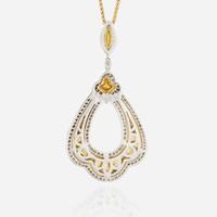 A bicolor gold and diamond pendant necklace