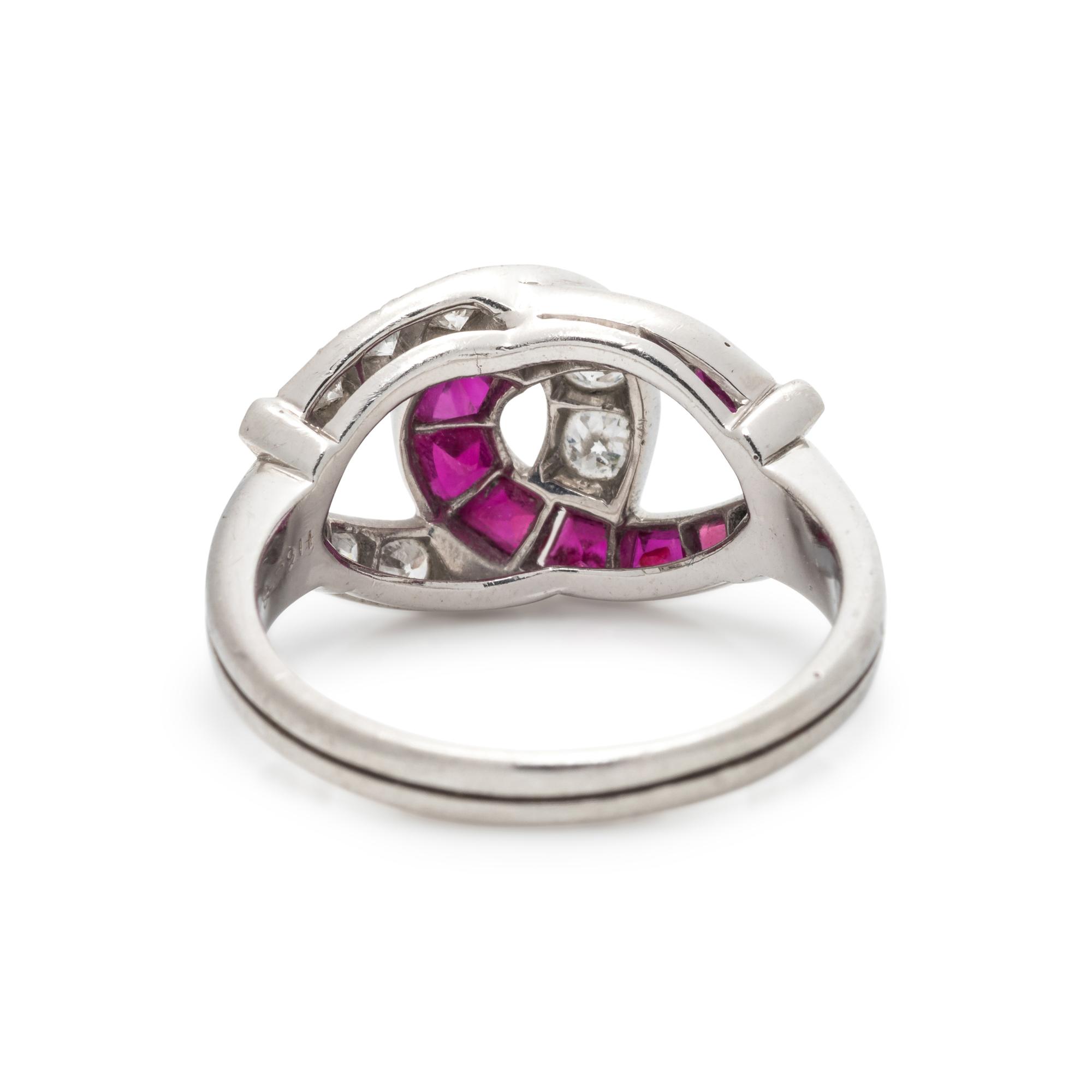 GUMBINER, DIAMOND AND RUBY HORSESHOE RING