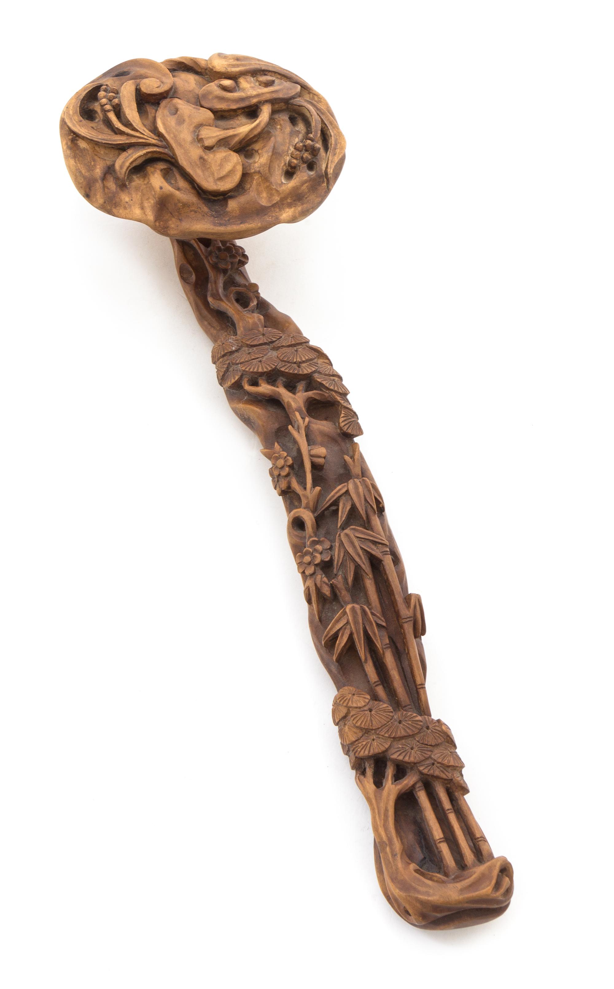 A Carved Boxwood Ruyi Scepter Length 12 3/4 inches.