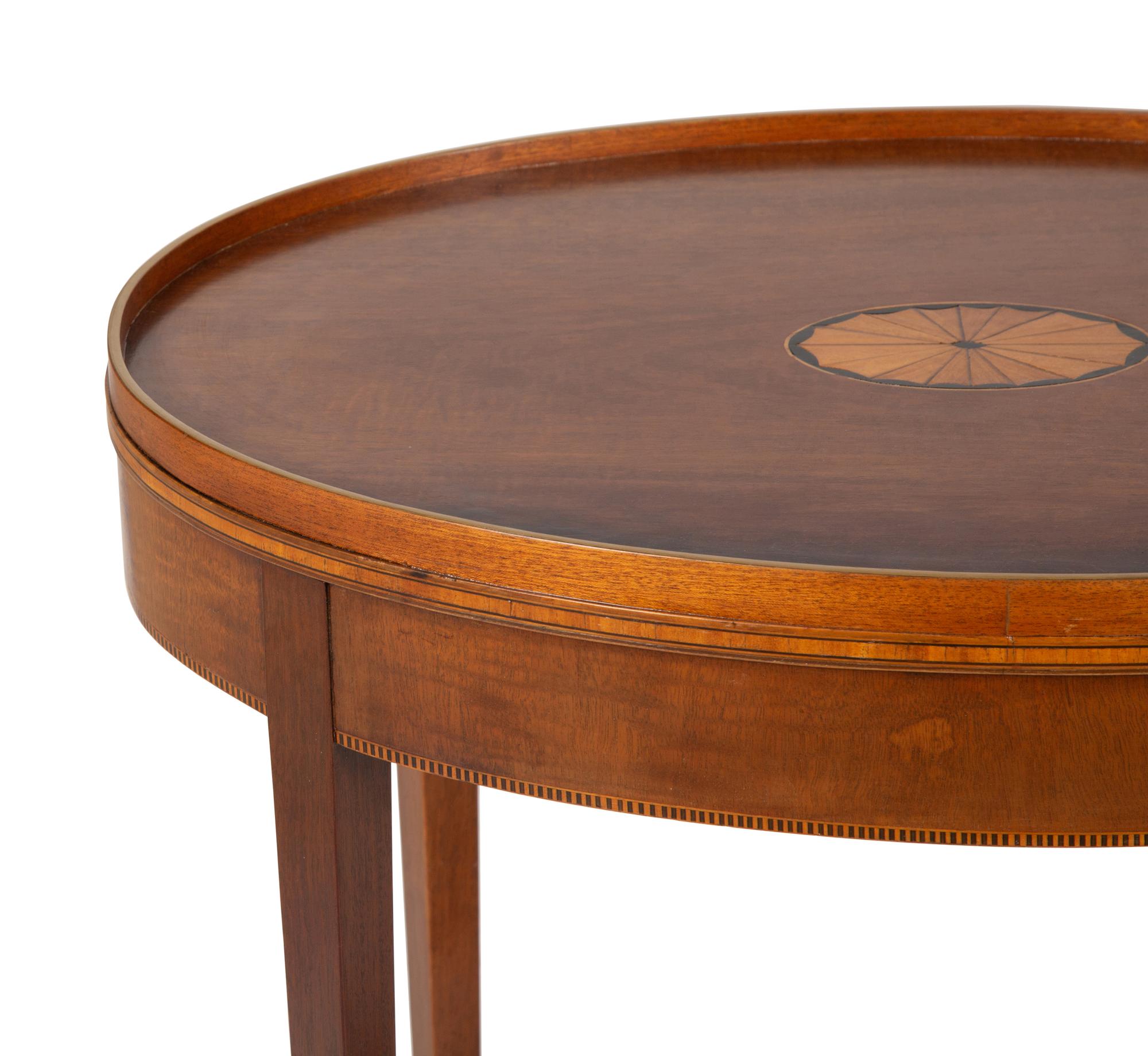 A George III Style Inlaid and Parcel Gilt Mahogany Oval Side Table — 20th Century