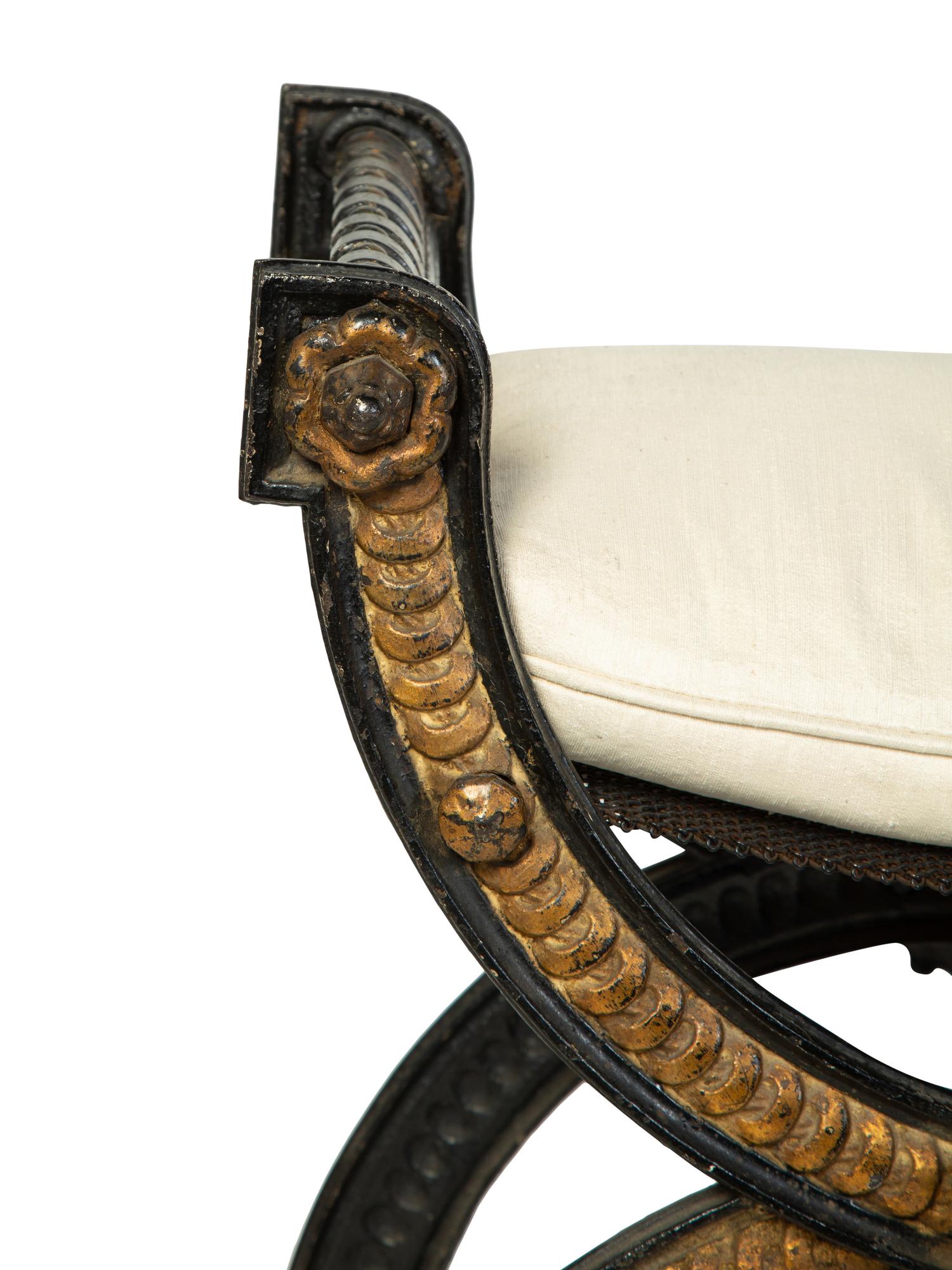 A Pair of Continental Cast Iron and Parcel Gilt Curule-form Tabourets — 19TH/20TH CENTURY