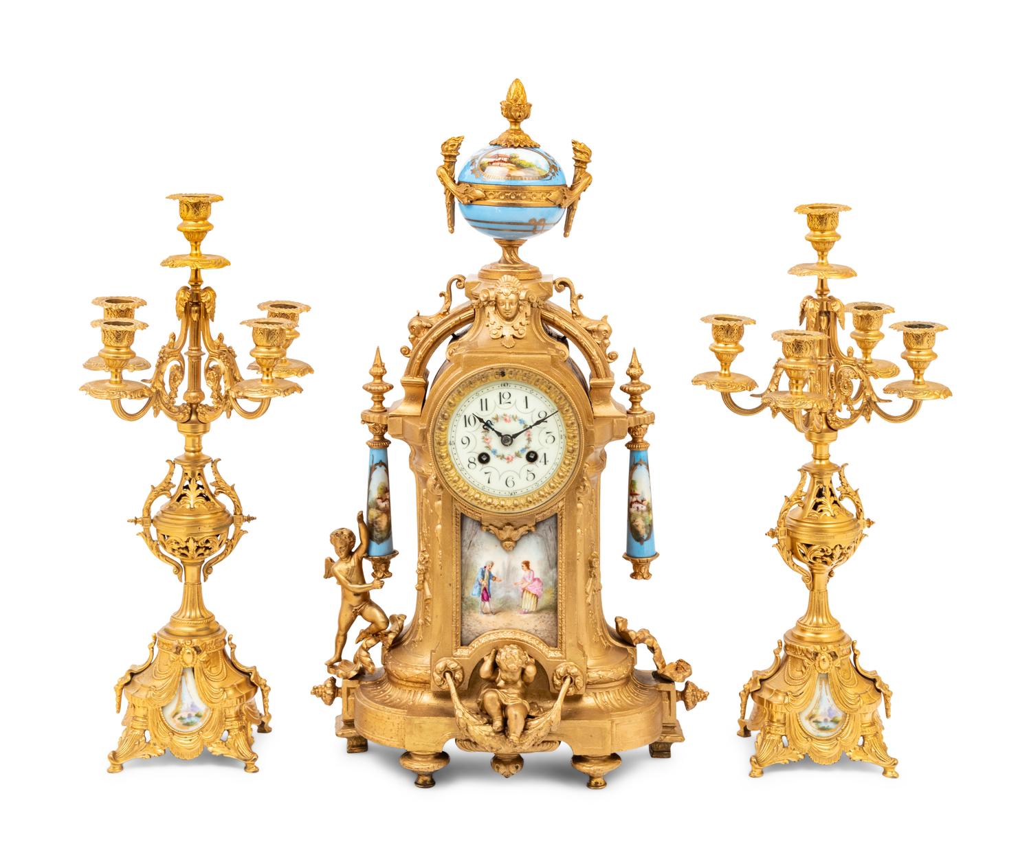A French Gilt Bronze and Sèvres Style Porcelain Mounted Three-Piece Garniture