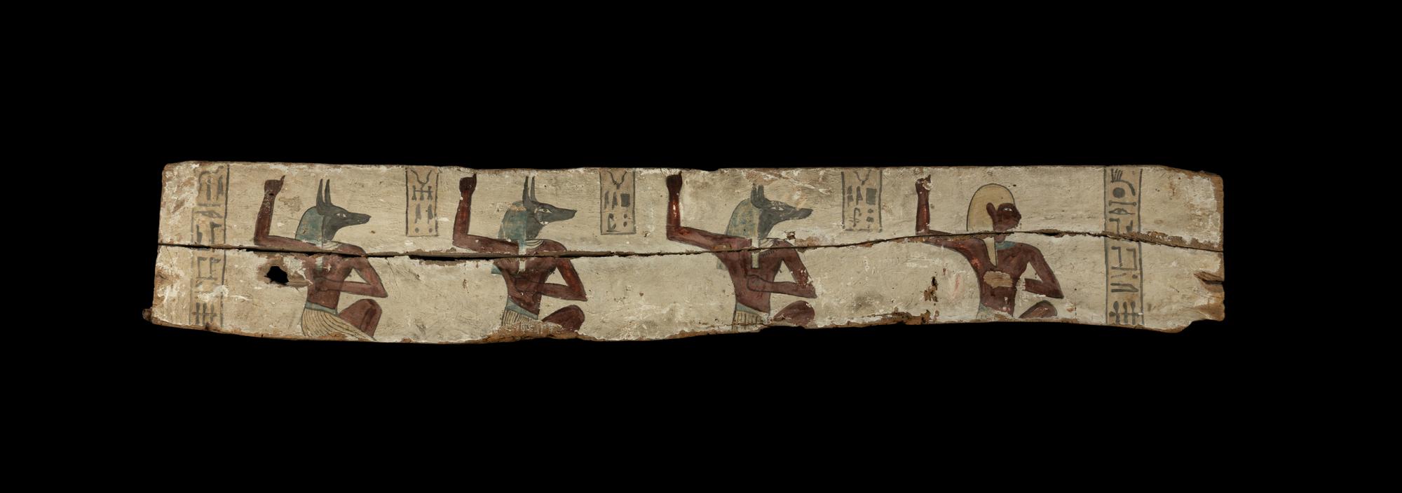 An Egyptian Painted Wood Sarcophagus Panel