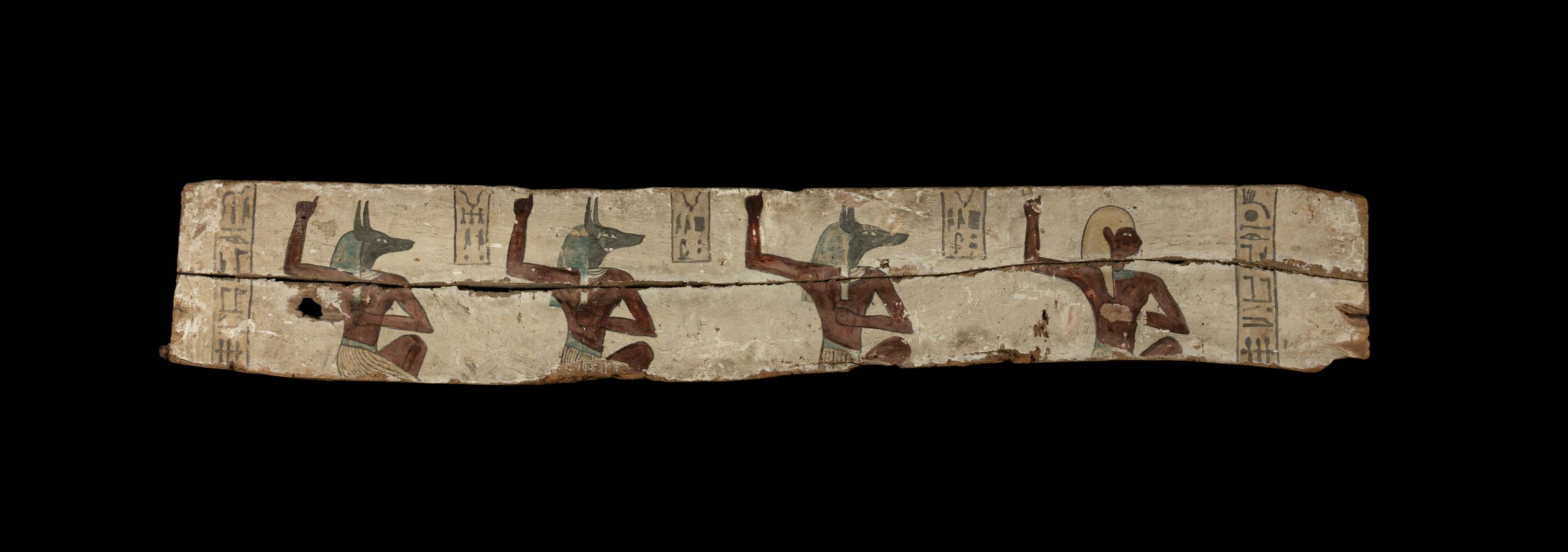 An Egyptian Painted Wood Sarcophagus Panel