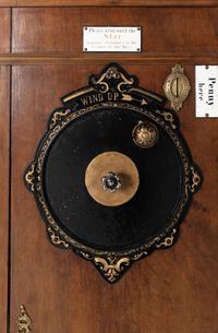 A Roepke Orchestral Book Playing Music Box with Fifteen Books
