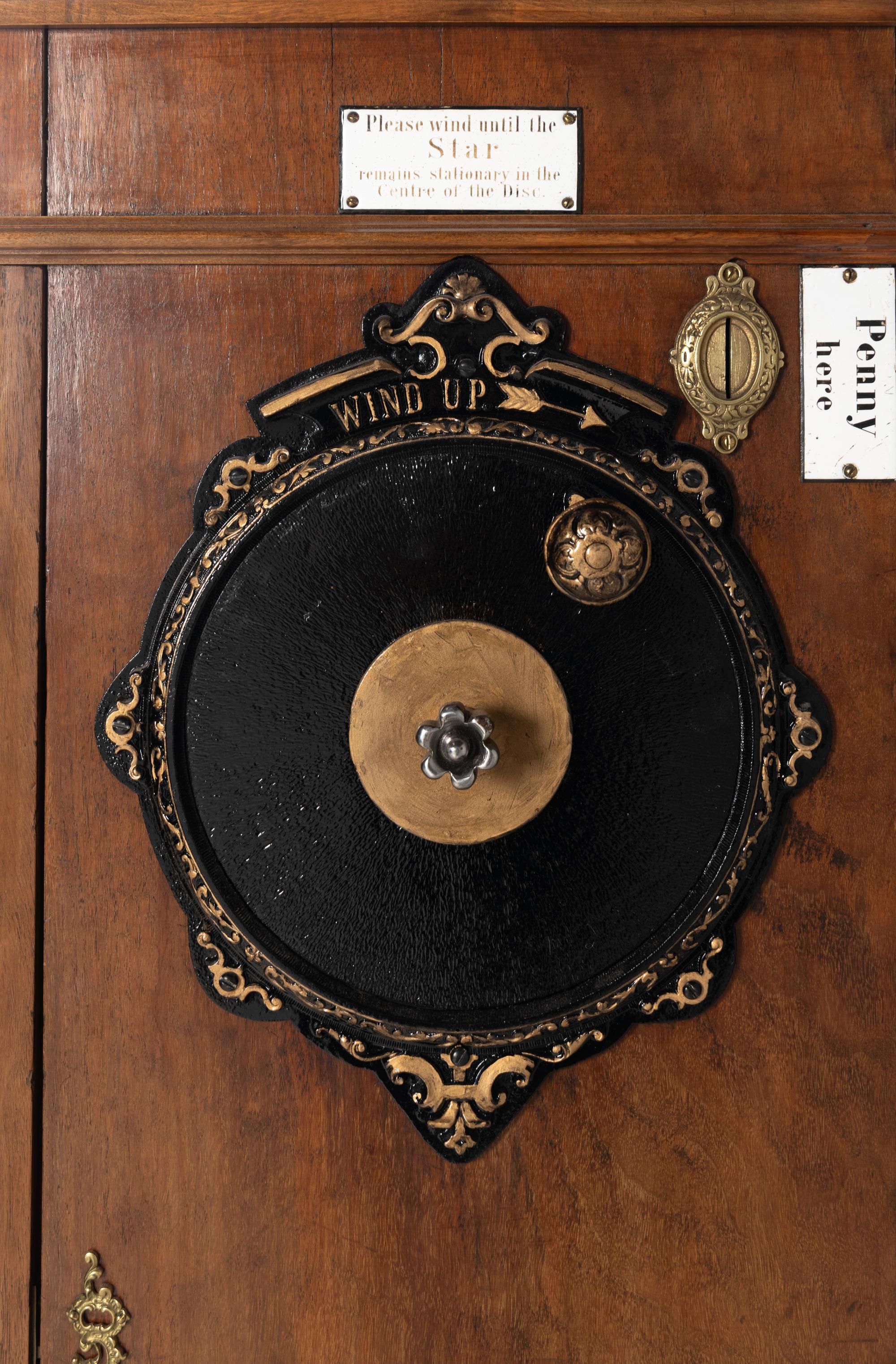 A Roepke Orchestral Book Playing Music Box with Fifteen Books