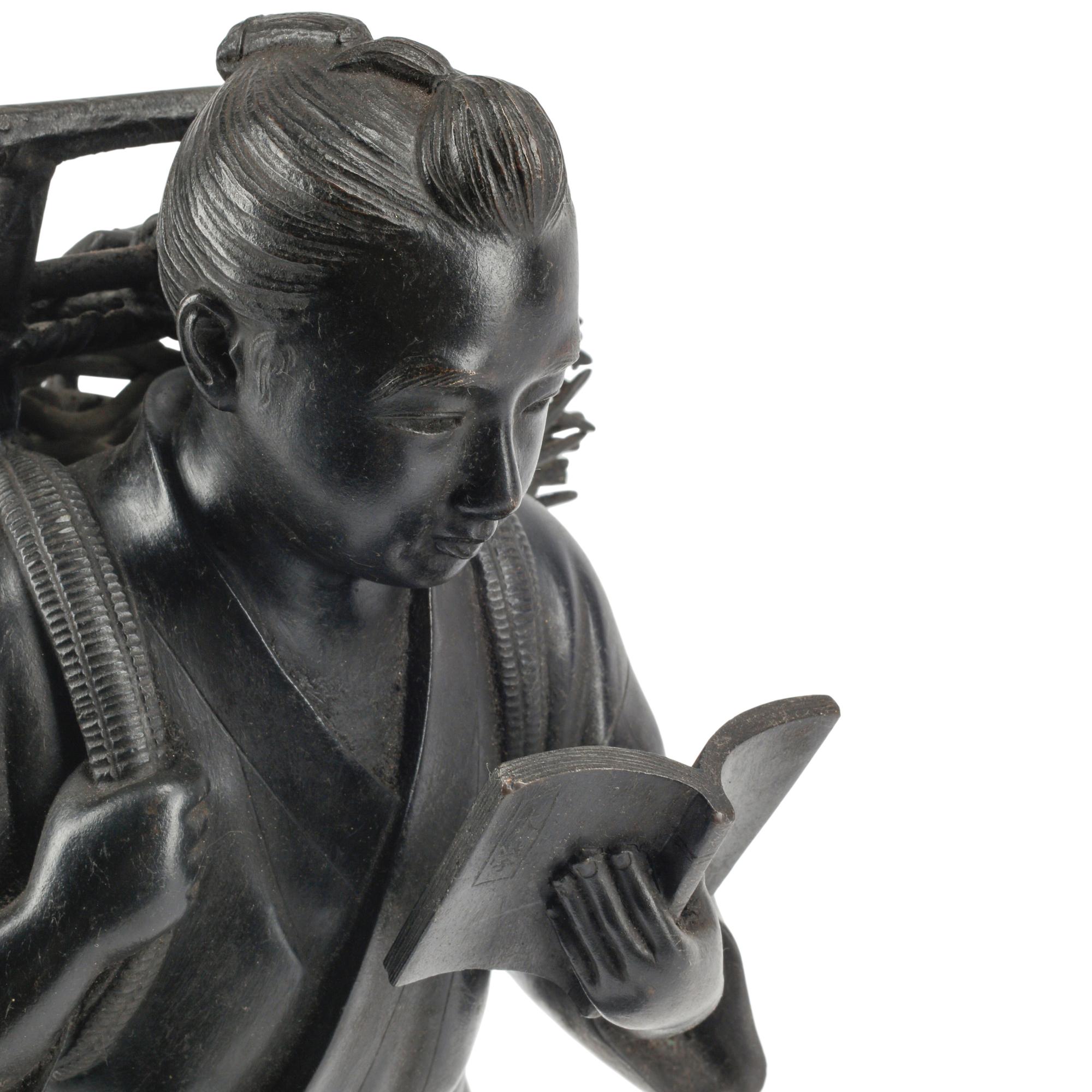 A Japanese Bronze Figure