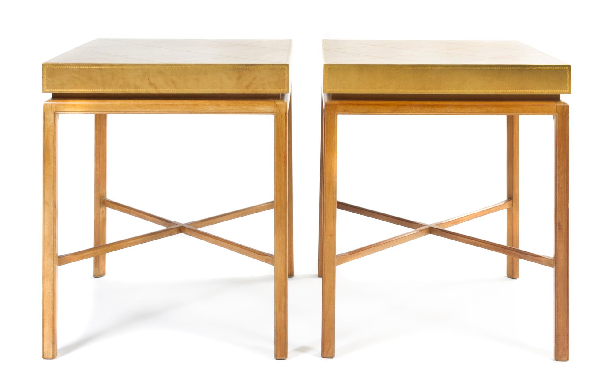 A Pair of Leather and Parchment Veneered End Tables, attributed to Tommy Parzinger Height 28 3/4 x width 23 7/8 x depth 23 7/8 inches.