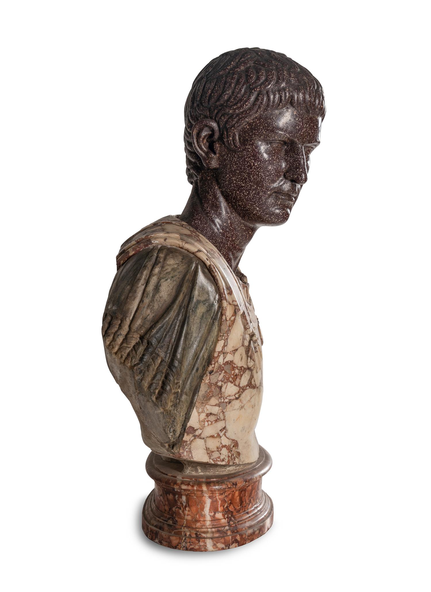 An Italian Carved Breccia Marble and Porphyry Bust of Augustus